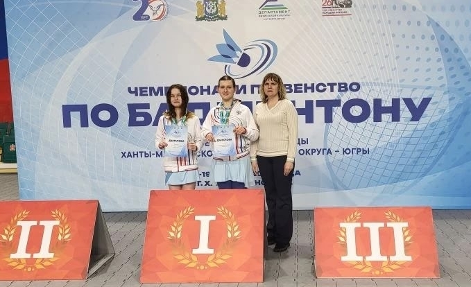 Медали окружных соревнований по бадминтону 